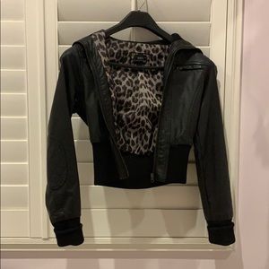 Leather jacket with animal print interior